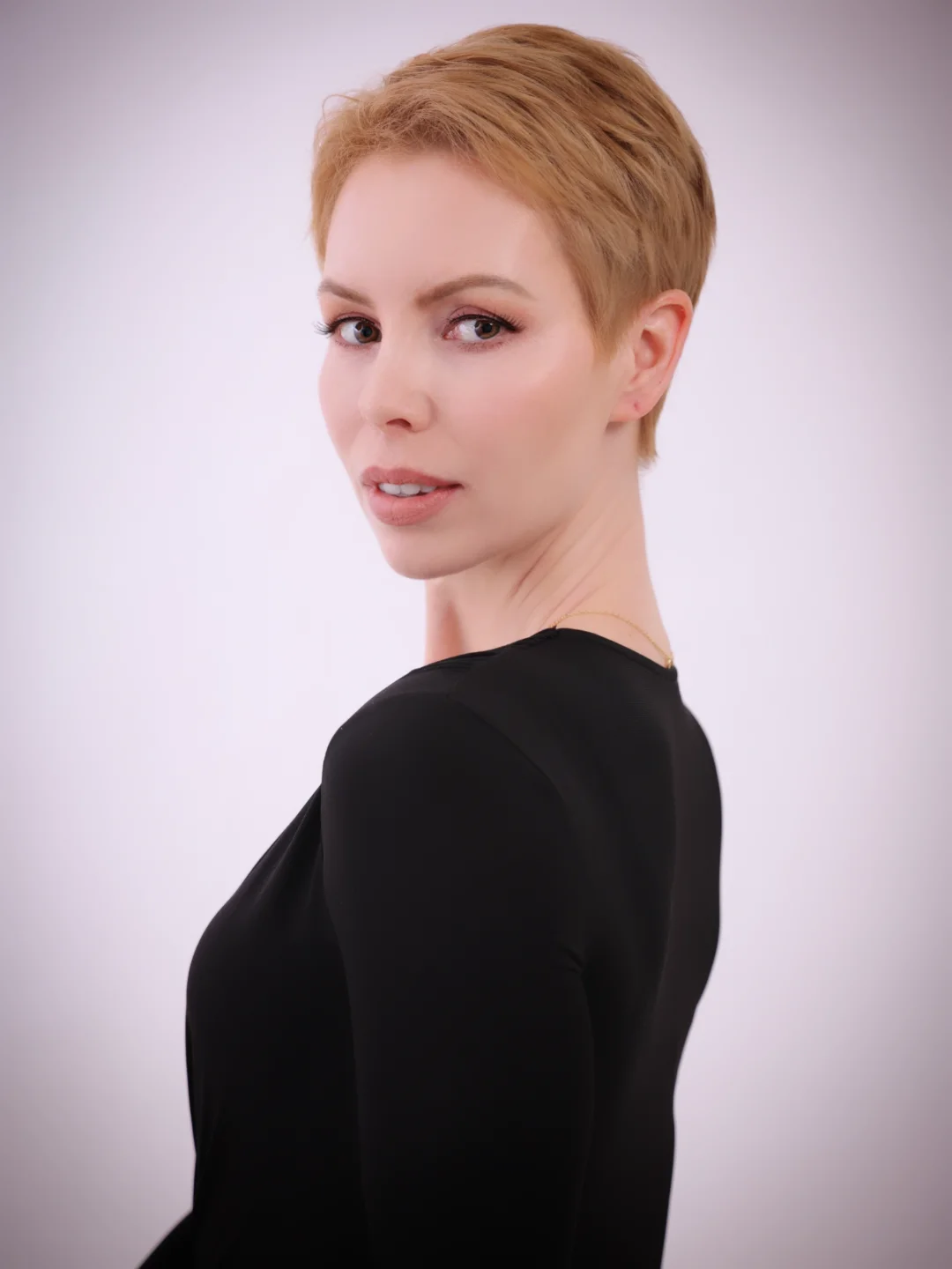 Editorial studio beauty with a luminous, skin-like finish